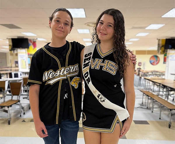 Yael and Ilan in cheer uniforms
